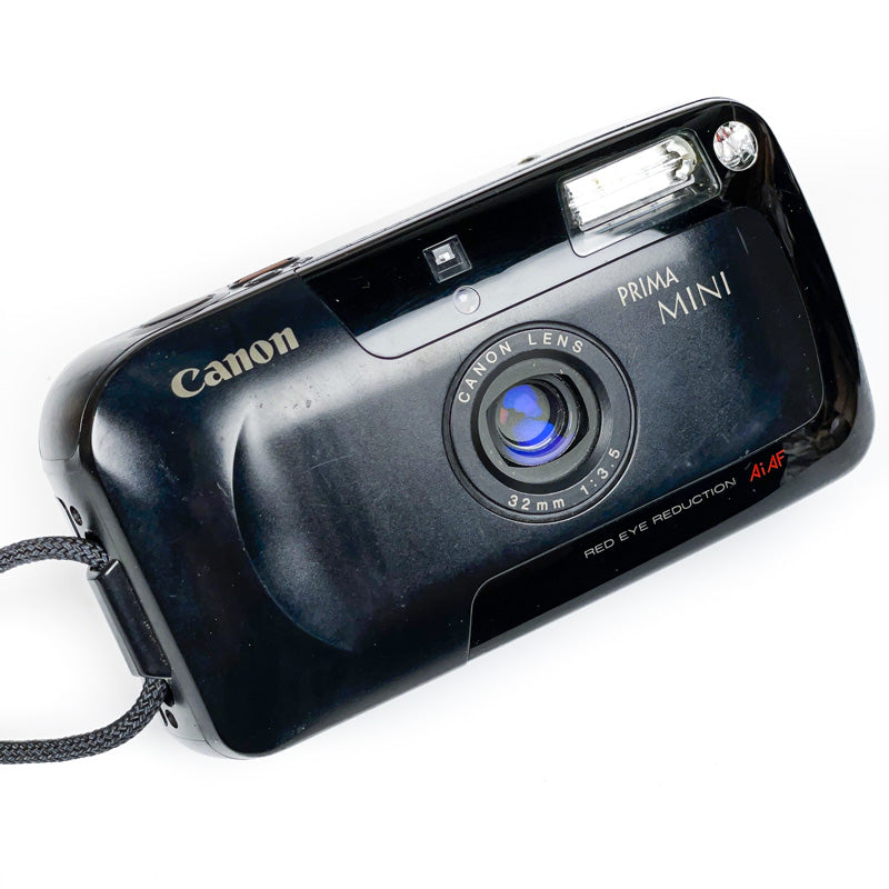 canon prima mini 32mm 3.5 compact point and shoot ancien vintage pellicule argentique film photo photographie appareil 24x36 35mm 135