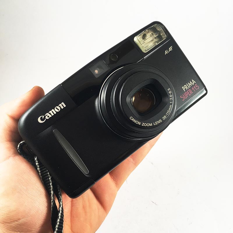 Canon appareil argentique prima super 115 noir 35mm compact autofocus zoom 38mm 115mm 3.6 8.5 point and shoot