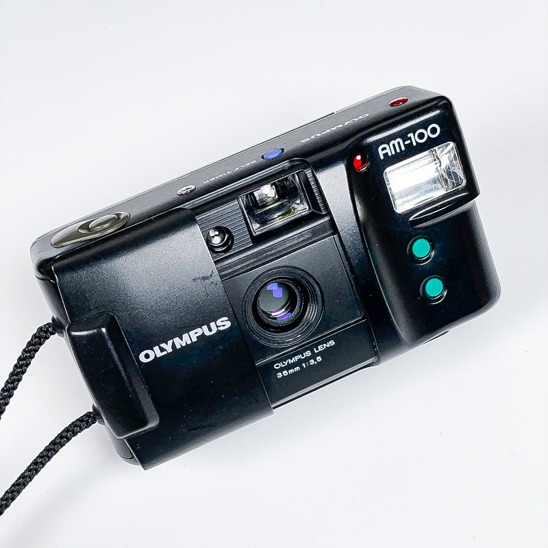 olympus am-100 am 100 compact point and shoot 35mm 3.5 film argentique pellicule photo photographie ancien vintage 135 35 24x36