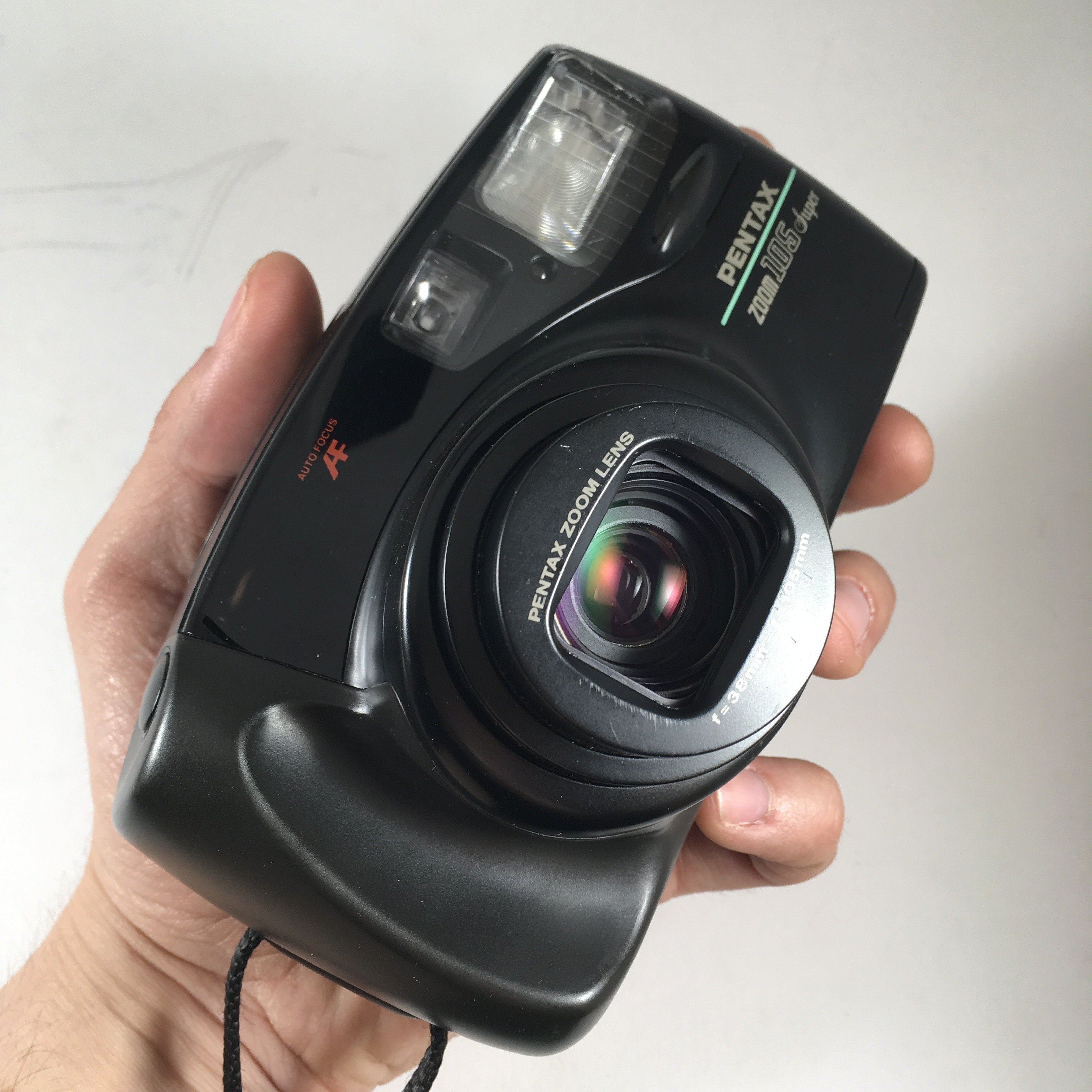 Pentax appareil argentique zoom super 105 38 105 35mm compact autofocus zoom