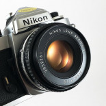 appareil reflex argentique nikon fe2 chrome 50mm 1.8 series e 35mm film