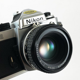 film camera reflex 1983 nikon fe2 chrome nikon nikkor 50mm 1.8 35mm vintage