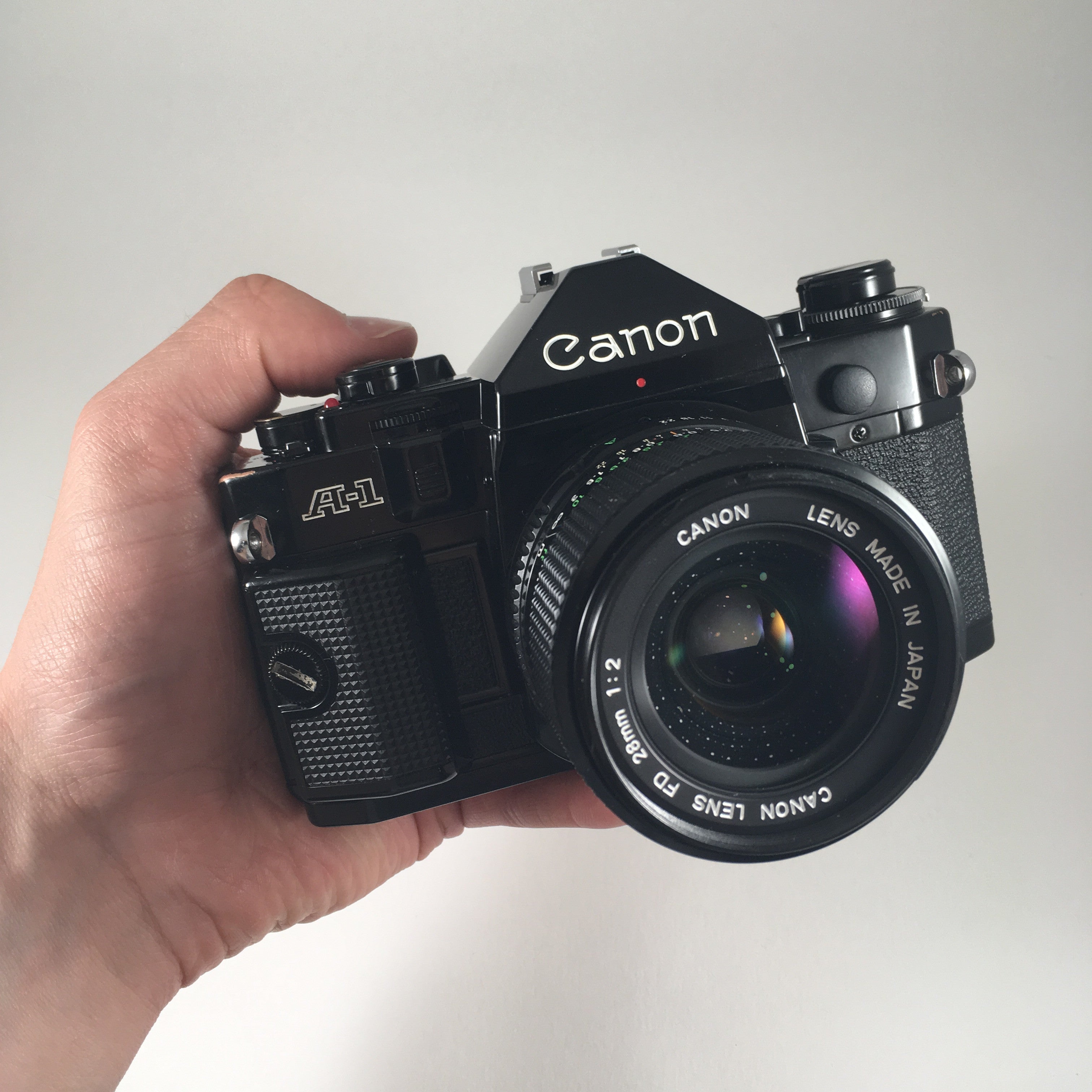 canon a1 ancien appareil reflex 35mm 135 noir 28mm 2 2.0