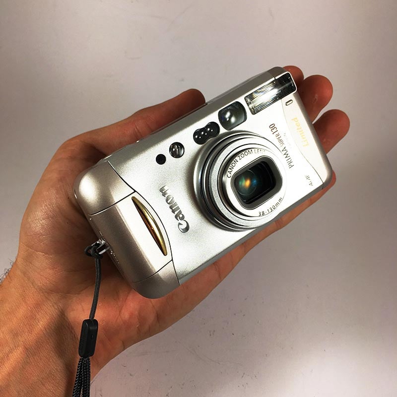 Canon Prima Super 130 appareil argentique compact 35mm 38-130mm vintage