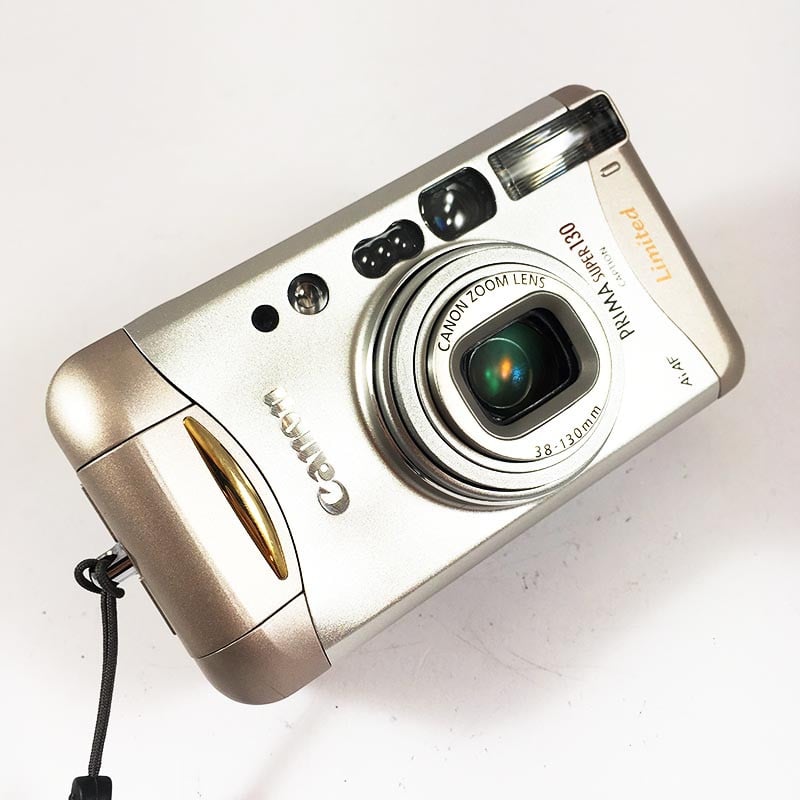 Canon Prima Super 130 appareil argentique compact 35mm 38-130mm vintage