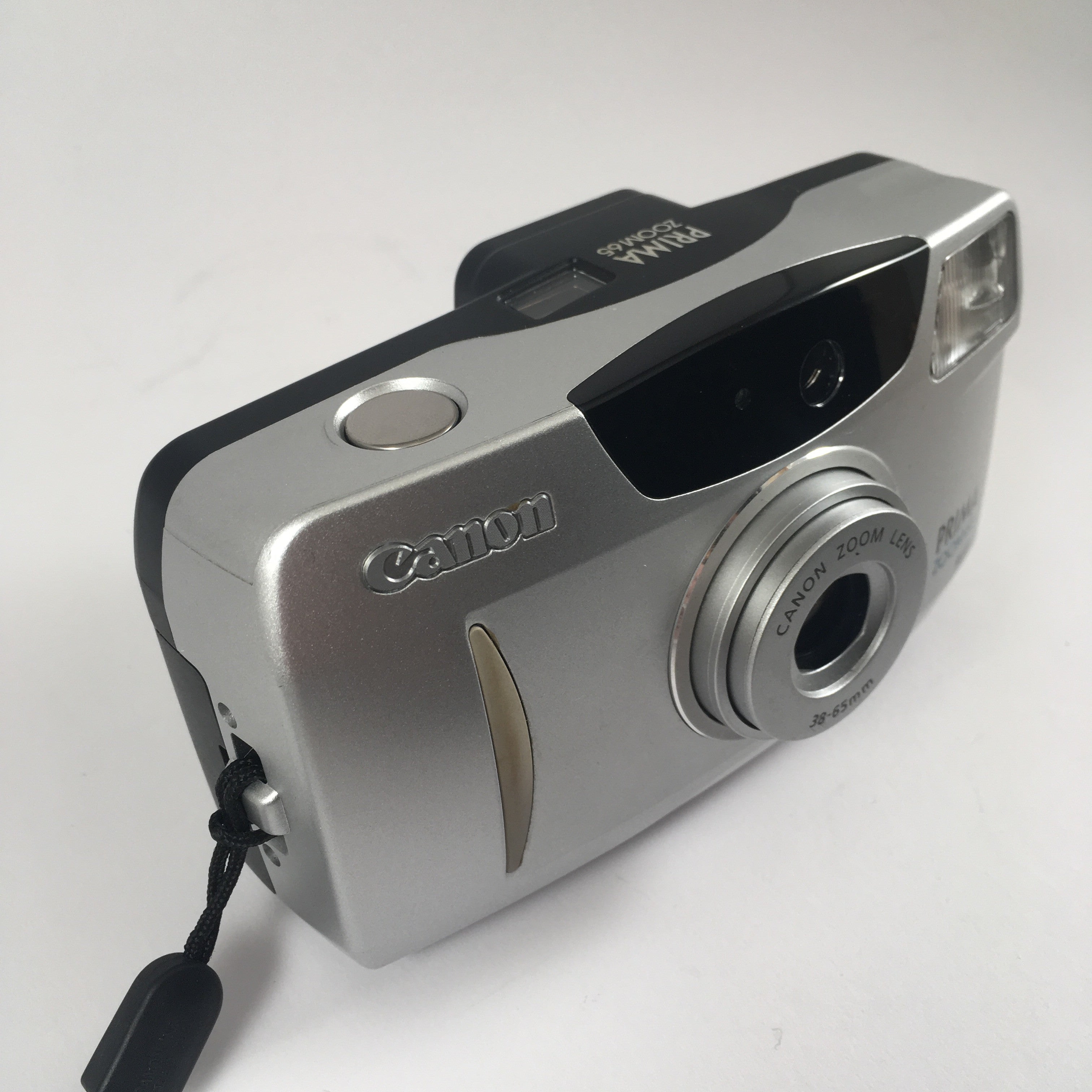 Canon Prima Zoom 65 appareil argentique compact 35mm 35-65mm vintage