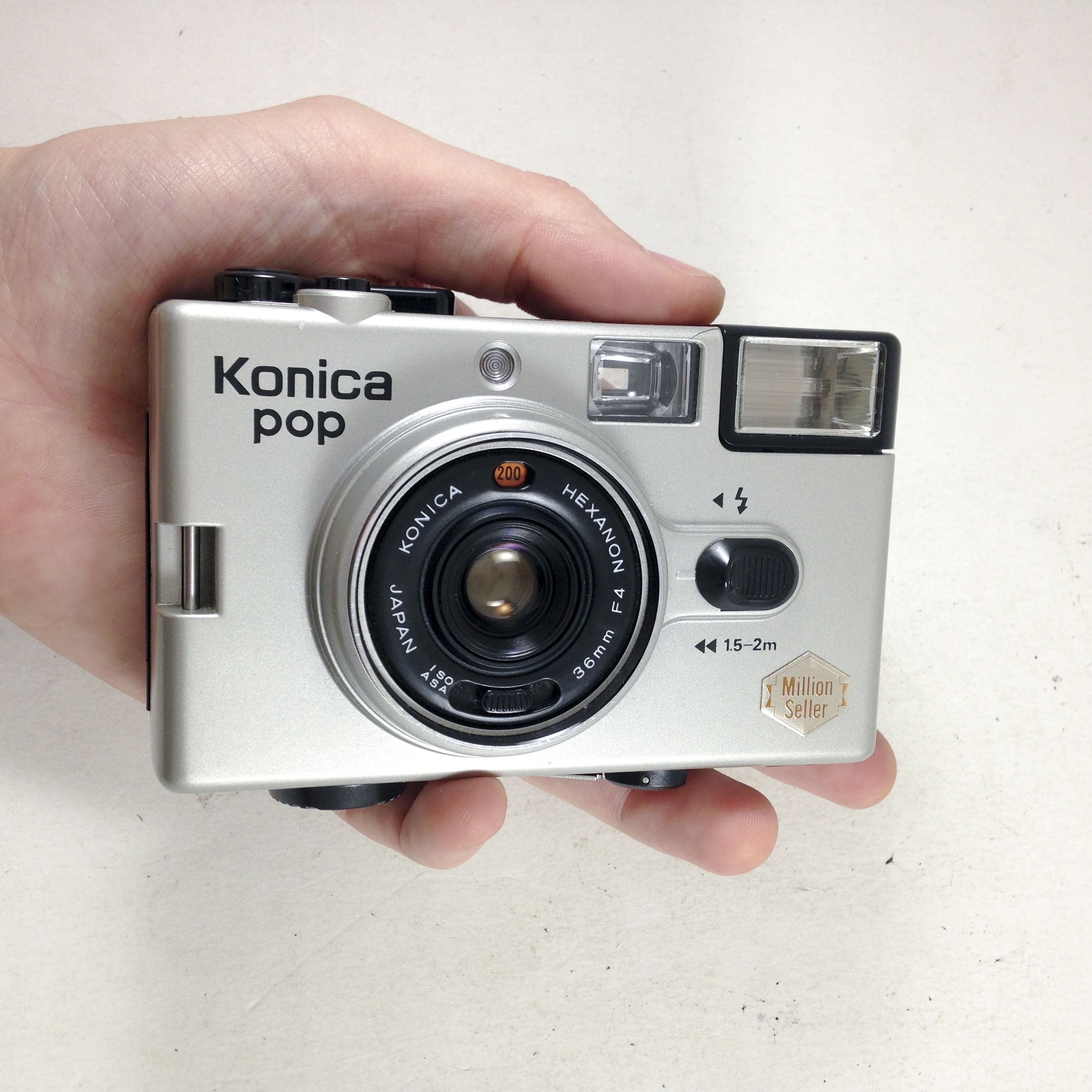 konica pop silver compact hexanon 36mm 4 million seller