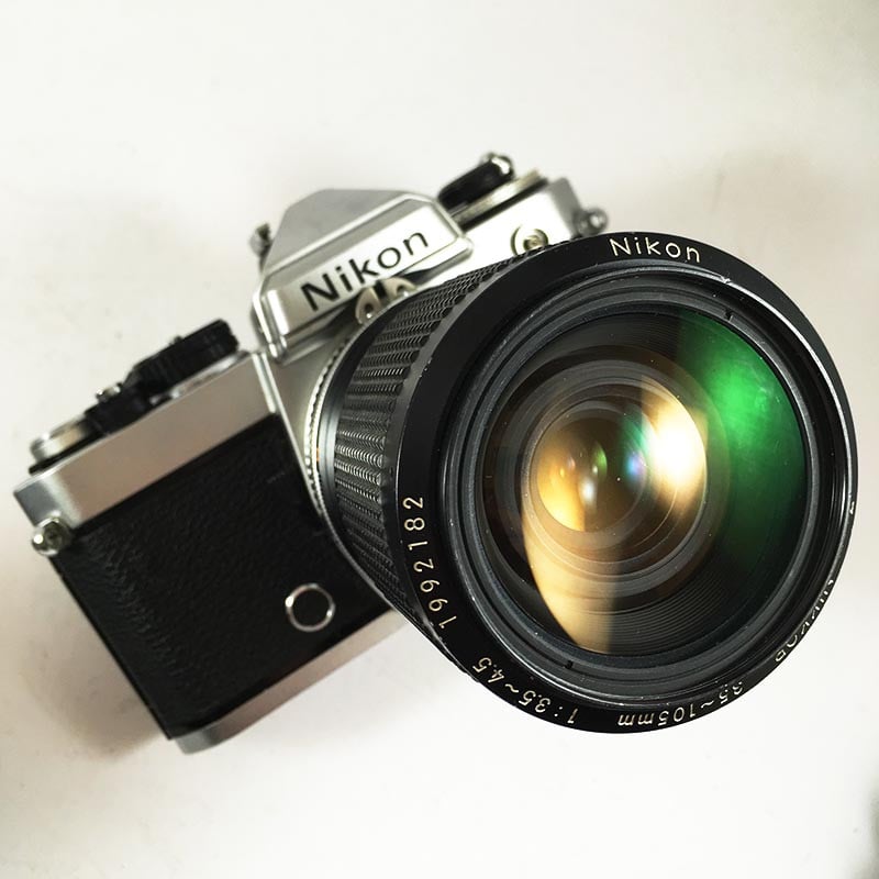 nikon fe chrome zoom nikkor 35mm 105mm 3.5 4.5 appareil argentique ancien reflex