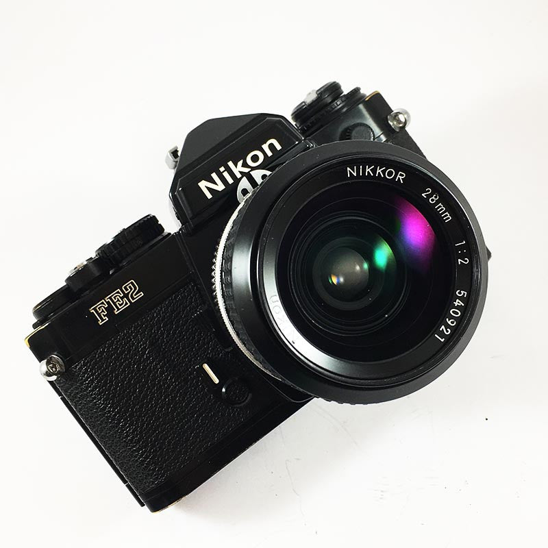 appareil reflex argentique nikon fe2 noir nikkor 28mm f2 35mm film