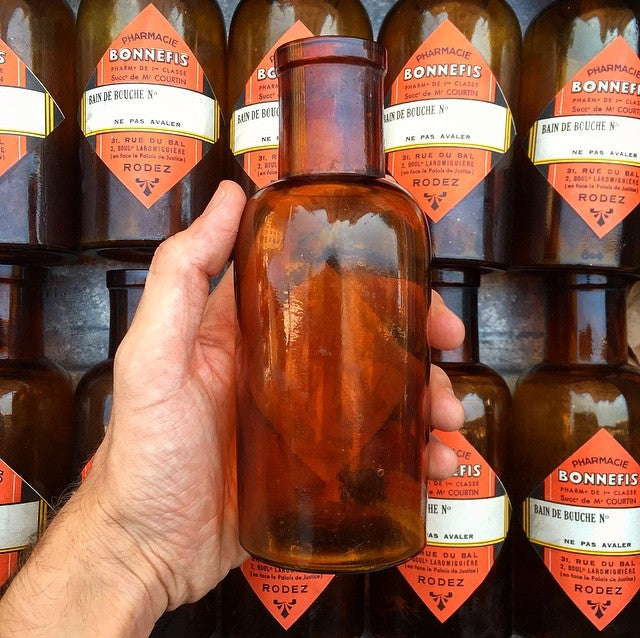 petite bouteille orange jaune verre bain de bouche bonnefis pharmacie ancienne vintage 1930 1940 flacon